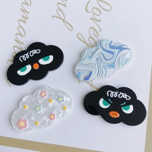 DIY abstract painting cloud pendants in acrylic with marble patterns and emoji designs