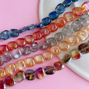 Close-up of laser square glass beads with colorful AB coating for DIY jewelry making