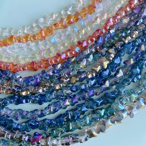 Iridescent butterfly glass beads for DIY necklaces and bracelets in vibrant rainbow colors