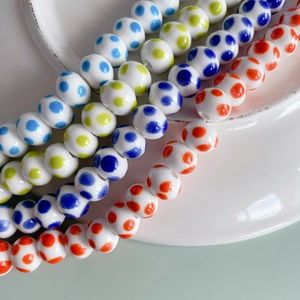 Perle in ceramica a pois blu, verdi e arancioni per creazione di gioielli fai-da-te