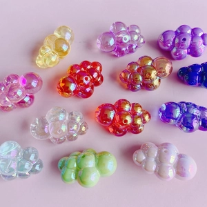 Macro detail of iridescent colorful cloud beads for DIY jewelry and phone charms