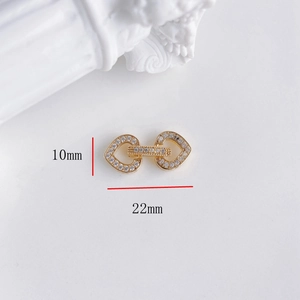 Connettore a forma di cuori intrecciati placcato oro con zirconi per gioielli DIY, 22x10mm