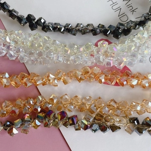 Macro shot of multi-faceted square crystal glass beads for DIY jewelry making