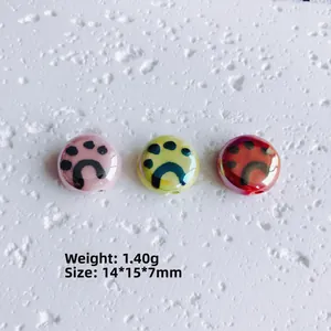 Polished ceramic paw print beads in pink yellow and red for DIY jewelry making