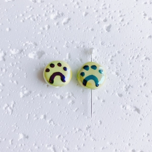 Hand-painted yellow ceramic cat paw beads with glossy finish for DIY jewelry making