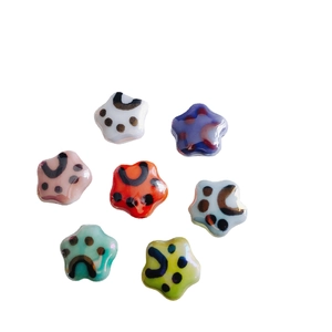 Polished ceramic paw print star beads in colorful set for DIY jewelry making