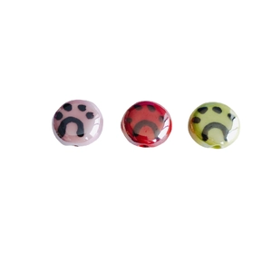 Flat round ceramic cat paw beads for DIY jewelry making in purple, red and green colors