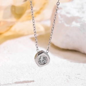 Silver zircon necklace with a geometric hexagonal pendant on a fine link chain