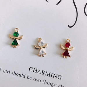 Three gold-plated angel pendants with colorful emerald, white, and ruby zircon stones