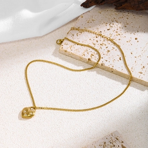 Collier en acier inoxydable doré avec pendentif cœur gravé soleil et cristaux fins