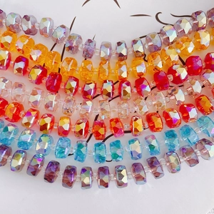Colorful faceted crystal glass beads for DIY jewelry making displayed in rows