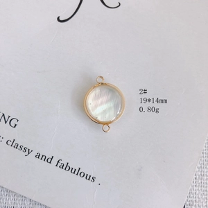 Connecteur rond doré avec incrustation en nacre irisante pour création de bijoux DIY