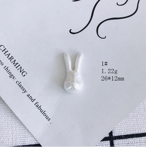 Detailed view of aurora rabbit resin pendant with dimensions 26x12mm and 1.22g weight