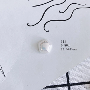 Macro detail of silver pentagon earring charm with 14.5mm size and 0.8g weight