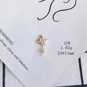 Detailed view of gold plated butterfly pendant with zircons for DIY jewelry making