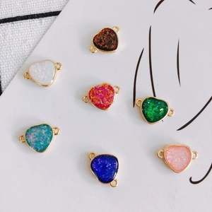 Colorful resin heart pendants with gold frames and dual loops for DIY jewelry making