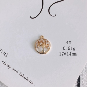 Detailed view of Tree of Life pendant in gold plating with sparkling cubic zirconia