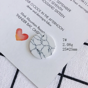 Detailed view of 25mm round white marble pattern acrylic pendant for DIY jewelry making