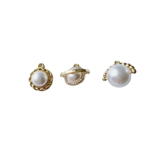 Three DIY pearl charms with gold alloy plating, including star and woven designs