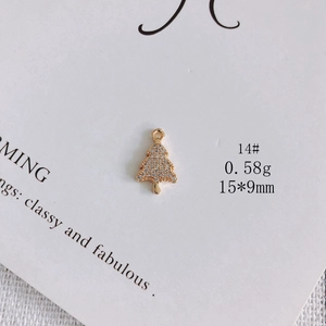 Detail of Christmas tree pendant with gold plating and white zircon micro-inlay