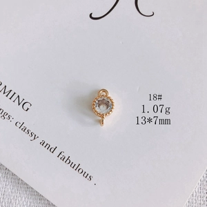 Detail of 13x7mm 18K gold plated zircon connector charm with beaded texture for DIY jewelry