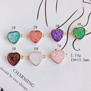 7 colorful heart-shaped DIY pendants with gold borders and double holes for necklaces