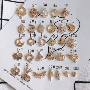 Set of 30 gold plated hollow charms with cubic zirconia for DIY jewelry making