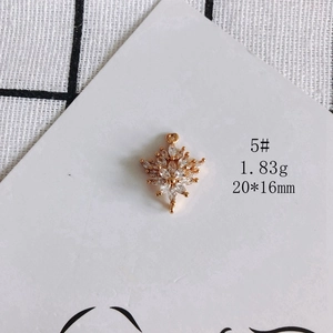 Detail of 18K gold plated snowflake pendant with marquise zircons for DIY jewelry making
