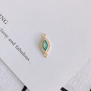 Marquise resin charm with golden border and zircon micro-pave for DIY jewelry making