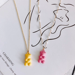 Cute resin gummy bear necklace set in yellow and pink with gold plated chains