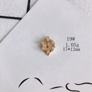 Detailed macro view of 18k gold-plated hollow star pendant with zircon stones