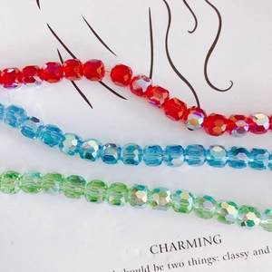 AB candy-colored cylindrical faceted crystal glass beads in red, blue, and green colors
