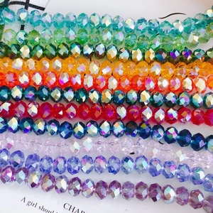 Colorful 10mm faceted glass crystal beads in assorted vibrant rows for DIY jewelry making