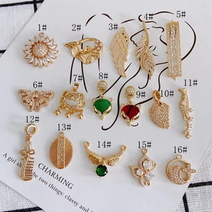 Selection of 16 gold plated jewelry charms with colorful zircon inlays for DIY accessories