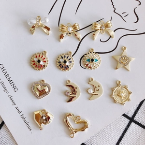 Lot de breloques dorées DIY avec œil protecteur, lune et perles pour colliers