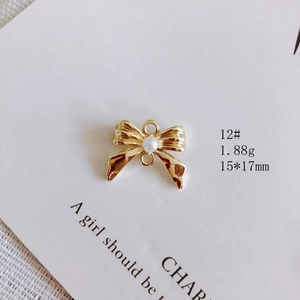 Pendentif nœud doré avec perle pour la création de colliers et boucles d'oreilles