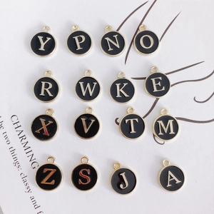 Round black enamel DIY alphabet pendants with golden metal edges for jewelry making