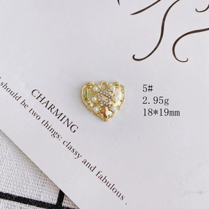 Detailed heart charm in gold alloy with pearls and small diamonds for jewelry making