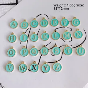 26Pcs mint green enamel round letter pendants in gold metal finish for DIY jewelry