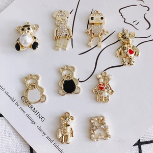 Set of 9 gold-plated cartoon bear and robot alloy charms with pearls and rhinestones