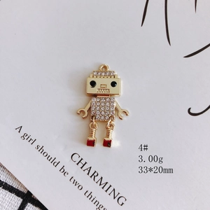Detailed view of a gold robot charm with rhinestones measuring 33 by 20mm and weighing 3g