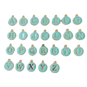 26-piece set of gold alloy round alphabet charms with light blue enamel finish for DIY