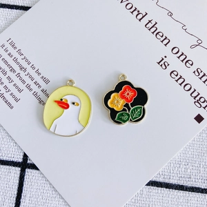 DIY jewelry charms with cartoon duck and flower patterns in enamel alloy for necklaces