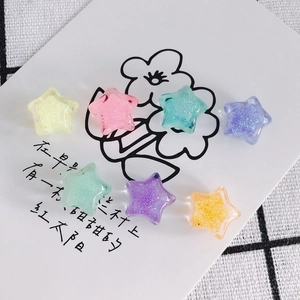 Glittery star-shaped resin charms in candy macaron colors for DIY jewelry making