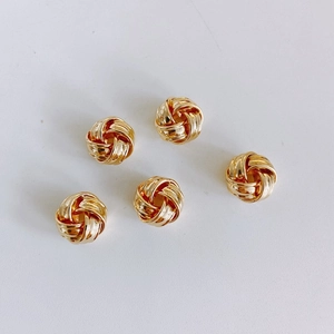 Detalle de 5 cuentas espaciadoras de nudo retorcido de oro de 14k para joyería DIY