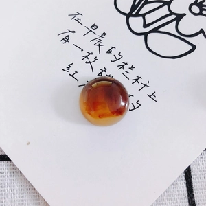 Macro detail of high-polish amber resin cabochon with natural textures for DIY accessories