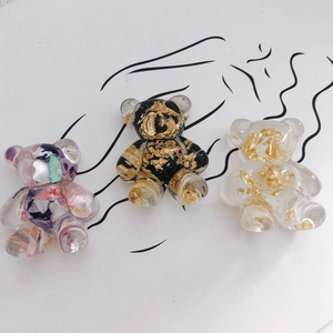 Three acrylic bear charms with colorful glitter and gold foil flakes for DIY jewelry