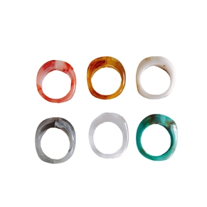 Set of six minimalist colorful resin rings with marble pattern and tortoise shell finish