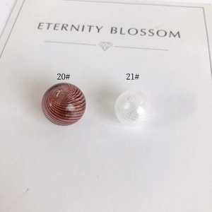 Handmade hollow glass beads with white spiral swirls in red and clear styles for jewelry DIY