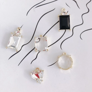 DIY jewelry charms set featuring geometric square and heart shaped faceted crystals
